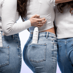 ladies taking picture with dry shampoo in pocket